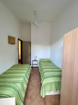 Letto o letti in una camera di Casa Lucia