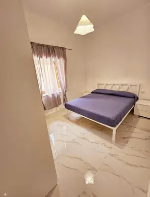 Letto o letti in una camera di Casa al Mare Lumèa