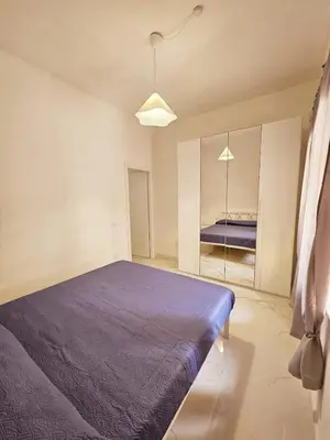 Letto o letti in una camera di Casa al Mare Lumèa