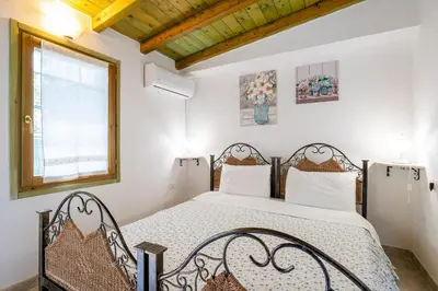 Letto o letti in una camera di Monolocale Elena