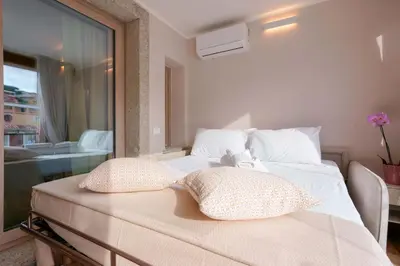 Letto o letti in una camera di La Rosa dei Venti Guesthouse