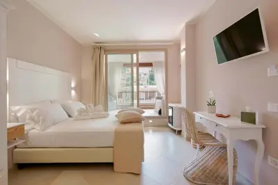 Letto o letti in una camera di La Rosa dei Venti Guesthouse