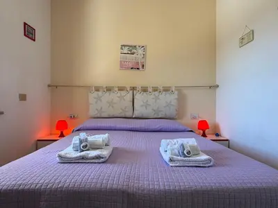 Letto o letti in una camera di Casa Valentina