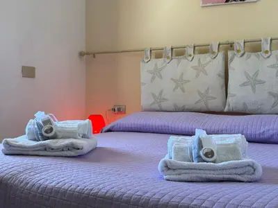 Letto o letti in una camera di Casa Valentina