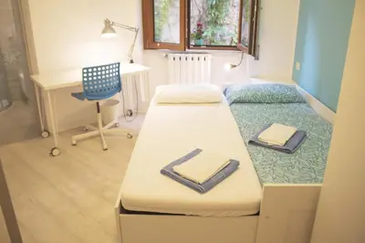 Letto o letti in una camera di Birsa's Rooms