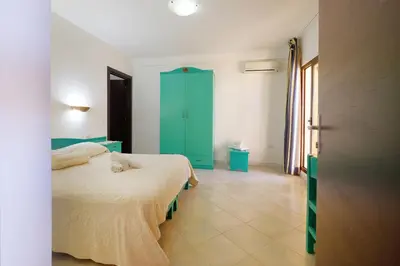 Letto o letti in una camera di Noa's