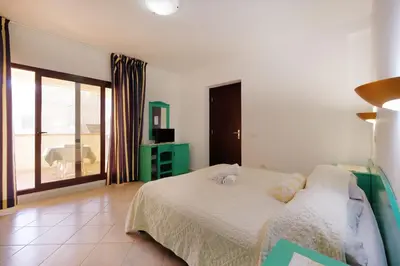 Letto o letti in una camera di Noa's