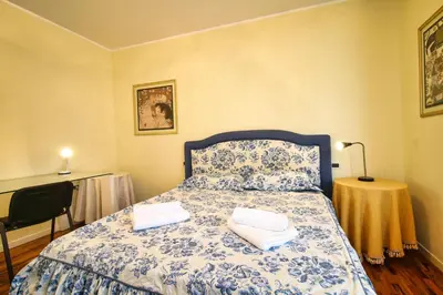 Letto o letti in una camera di Villa Mattei