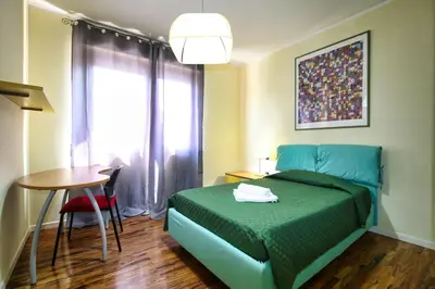 Letto o letti in una camera di Villa Mattei
