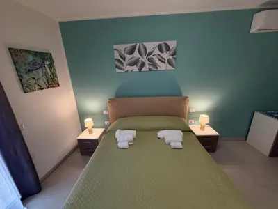 Letto o letti in una camera di Toti 96 Apartment
