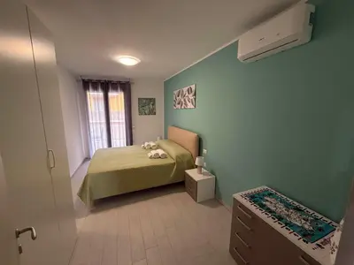 Letto o letti in una camera di Toti 96 Apartment