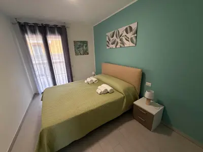 Letto o letti in una camera di Toti 96 Apartment