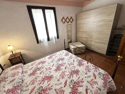 Letto o letti in una camera di App C163 con Terrazza a Sottotorre , Calasetta