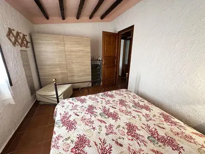 Letto o letti in una camera di App C163 con Terrazza a Sottotorre , Calasetta