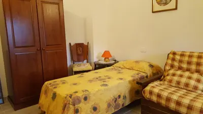 Letto o letti in una camera di La Ghirielle