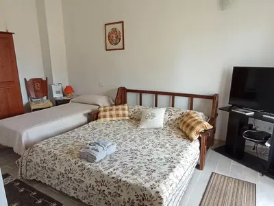 Letto o letti in una camera di La Ghirielle