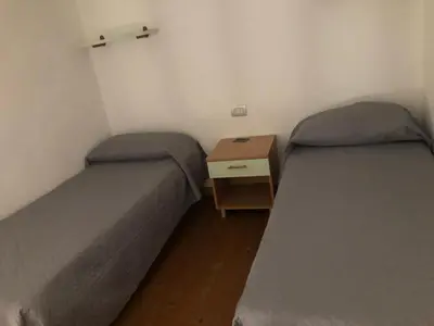 Letto o letti in una camera di Cagliari nel cuore di Castello