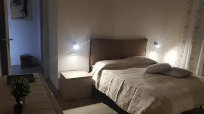 Letto o letti in una camera di Casa Gonnesa