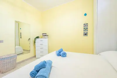 Letto o letti in una camera di Casa Nucci - Free WIFI - 100mt from the beach