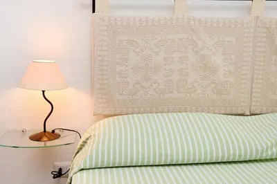 Letto o letti in una camera di AmareSardegna11 con giardino