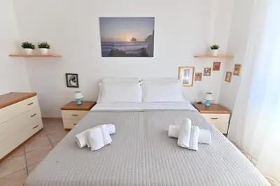 Letto o letti in una camera di IzzHome BiHappy
