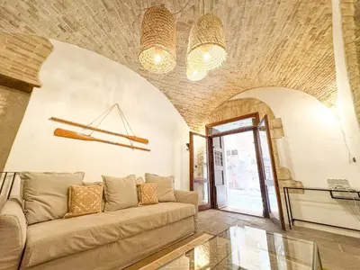 Area soggiorno di Kalma Arched Loft - Unique Brick Vault in City Heart