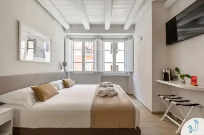 Letto o letti in una camera di Molo 39