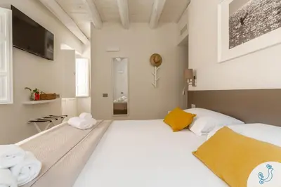 Letto o letti in una camera di Molo 39