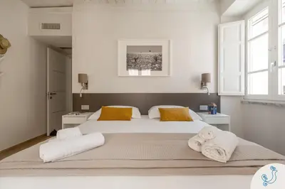 Letto o letti in una camera di Molo 39