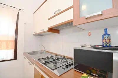 Cucina o angolo cottura di AmareSardegna12 con vista mare