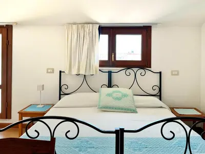 Letto o letti in una camera di B&B Tre - Rooms & Relax