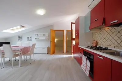 Cucina o angolo cottura di Glicine e sole by Teuladaapartments