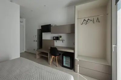 Letto o letti in una camera di ARGHENTU Rooms