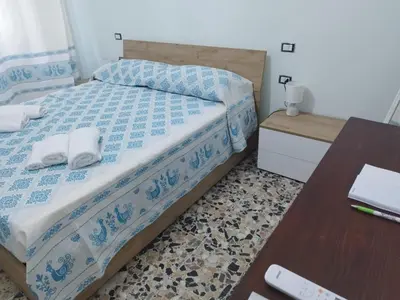 Letto o letti in una camera di Colombi 38 Cagliari