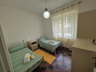 Letto o letti in una camera di Casa Vacanze Fiori di Lina