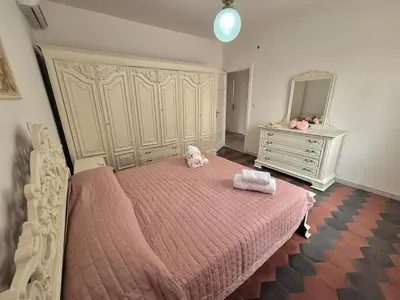 Letto o letti in una camera di Casa Vacanze Fiori di Lina
