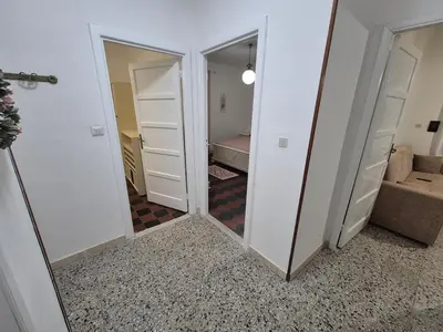 Letto o letti in una camera di Casa Vacanze Fiori di Lina