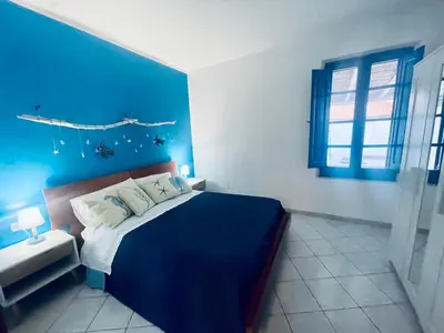 Letto o letti in una camera di Su Chelu