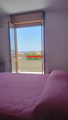 Letto o letti in una camera di CASA Vacanze LORY