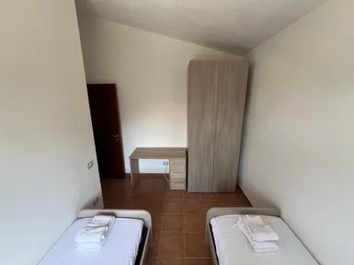 Letto o letti in una camera di La Terrazza Sa Cruxitta