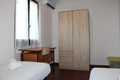 Letto o letti in una camera di Residence Baia Azzurra