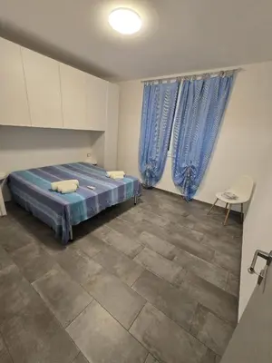 Letto o letti in una camera di Le Dune di Quarzo