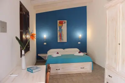 Letto o letti in una camera di La Fattoria Delle Tartarughe