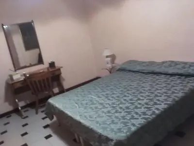Letto o letti in una camera di casa vacanze Esperu