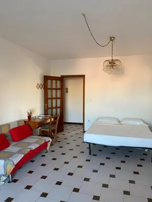 Letto o letti in una camera di casa vacanze Esperu
