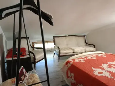 Letto o letti in una camera di Casa Eleonora