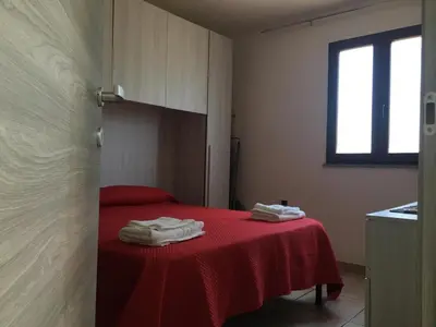 Letto o letti in una camera di Casa Francesco