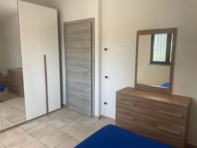 Letto o letti in una camera di Casa Francesco