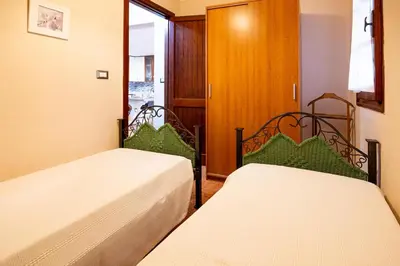 Letto o letti in una camera di Villetta Elena