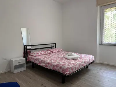 Letto o letti in una camera di Il tuo Rifugio in Città